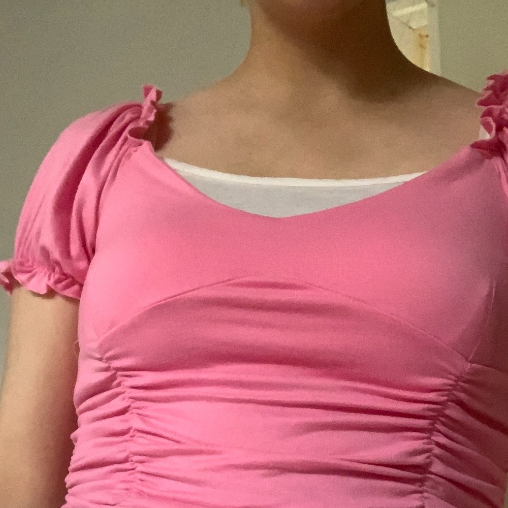 Cropped pink top.